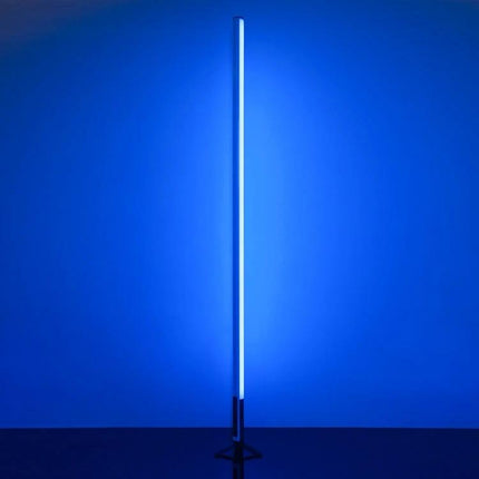 LUXCeO Mood1 85cm RGB LED Stick Light for Video and Photo standing vertically with blue ambient lighting for photo and video shoots