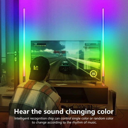 LUXCeO Mood1 85cm RGB LED Stick Light for Video and Photo illuminating a gaming setup with synced music-reactive colors