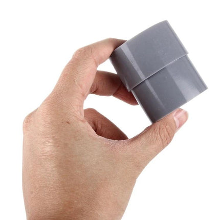 Fittest Rubber Tool Set for Camera Lens Removal with 9 Pieces held in hand showing a gray rubber remover piece for safe lens ring removal