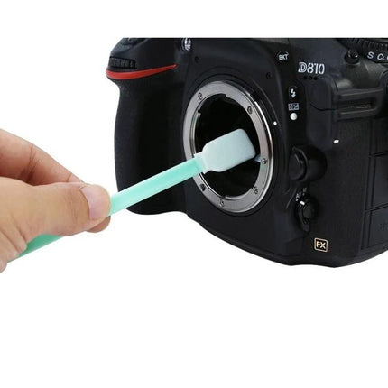 Set of 6 Cleaning Swab Sticks for Camera and Screen Cleaning - person using swab to clean DSLR sensor