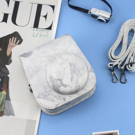 Marble Leather Case for Fujifilm Instax Mini Cameras with Strap shown in white marble PU with removable strap and camera protection