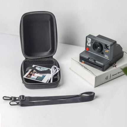 Shockproof EVA Camera Case for Polaroid One Step 2 with open interior showing photos, charger and detachable strap