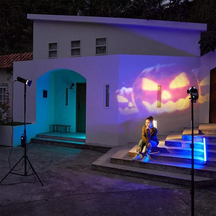 Godox AK-R25 Square Flash Head Adapter for AK-R21 Projection mounted on stands projecting pumpkin face on house for portrait lighting setup