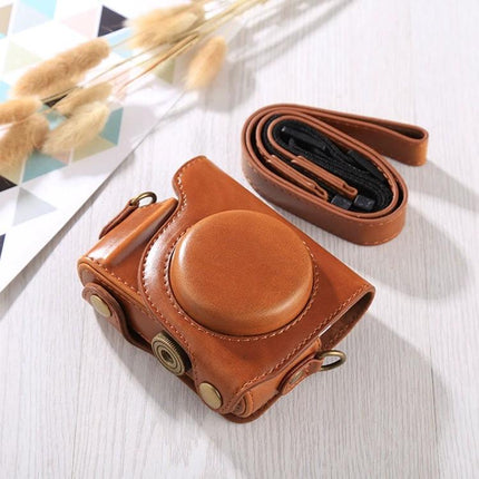 Protective PU Leather Full Body Camera Case with Adjustable Strap for Daily Use brown camera case on table