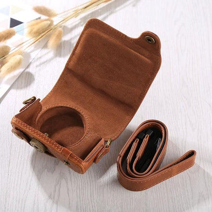 Protective PU Leather Full Body Camera Case with Adjustable Strap for Daily Use in brown open view, removable strap, suede interior