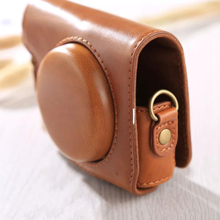 Protective PU Leather Full Body Camera Case with Adjustable Strap for Daily Use in brown showing front dome and side ring