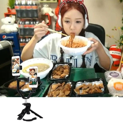 Adjustable Phone Holder for Daily Video Calls and Streaming showing streamer eating mukbang with hands-free phone positioning