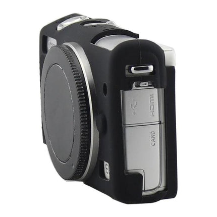 Soft Silicone Protective Case for Canon EOS M100 Camera in black showing port access and button cutouts, stretchable durable silicone protection