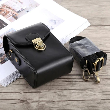 PU Leather Protective Case for Cameras with Hand Straps shown in black with removable shoulder strap and brass clasp
