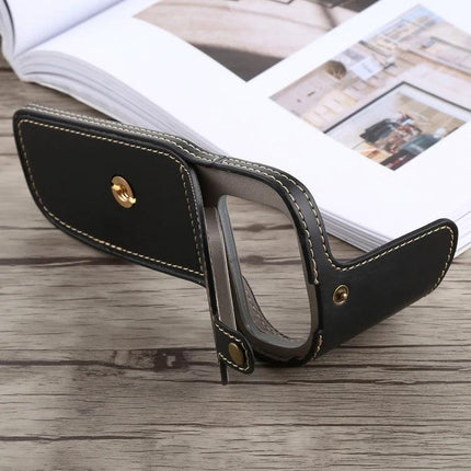 Protective PU Leather Half Case with Thread for Canon Cameras – black stitched half-case showing base, strap and brass screws