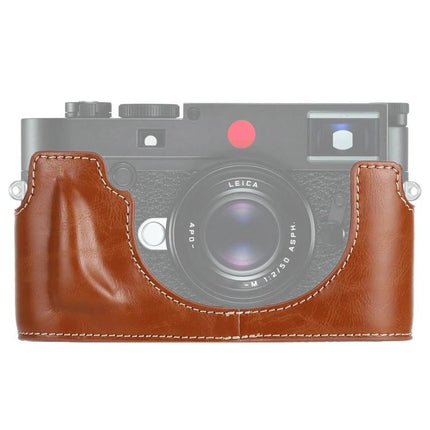 Durable PU Leather Half Case for Digital Camera Protection in brown showing stitched front cover