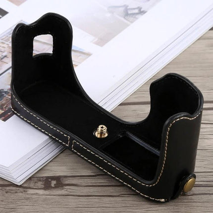 Protective PU Leather Half Case for Fujifilm X100F Camera Protection black PU leather half-case showing stitching and tripod screw