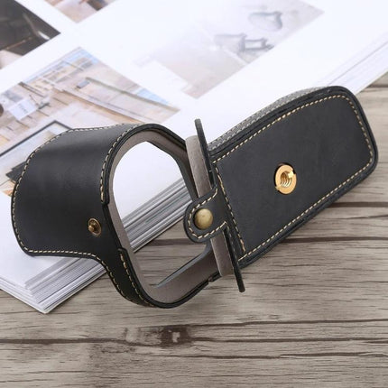 Classic PU Leather Protective Half Case for Canon DSLRs shown black with gold hardware on wooden table, durable PU leather camera half case