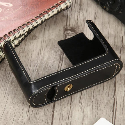 PU Leather Half Case with 1/4 Inch Thread for Leica Q Camera - black stitched protective half case on wooden tabletop