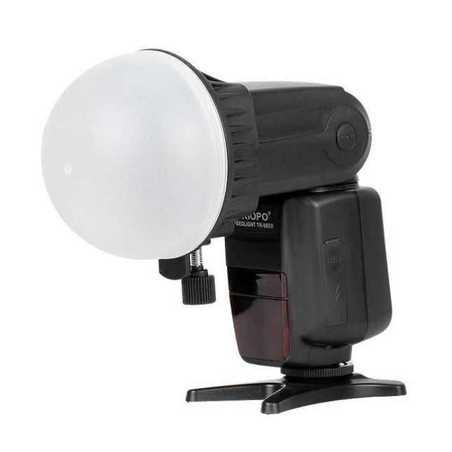 Triopo TR-08 Softbox Kit with Honeycomb Grid and Color Filters mounted on a camera flash to soften portrait and product lighting
