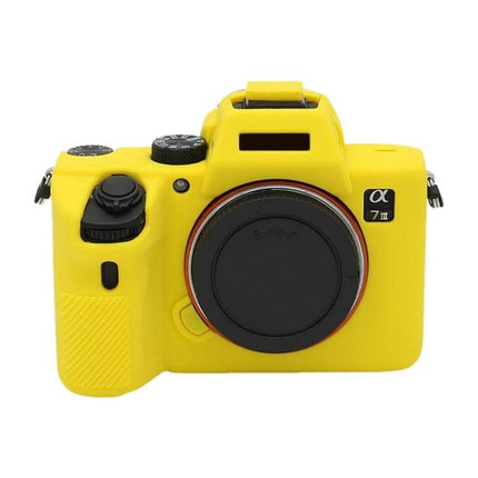 Soft Silicone Protective Case for Sony Mirrorless Cameras in bright yellow fitted on camera, stretchable durable silicone shield preventing scratches and impacts