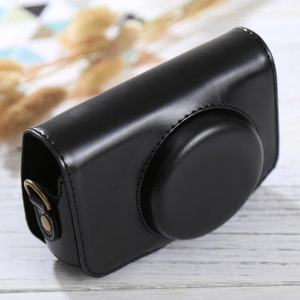 PU Leather Protective Case with Strap for Canon PowerShot Cameras shown in black, durable exterior and soft interior, travel-ready camera protection