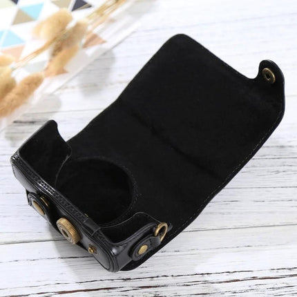 PU Leather Protective Case with Strap for Canon PowerShot Cameras - black open case showing soft interior and wrist strap attachment