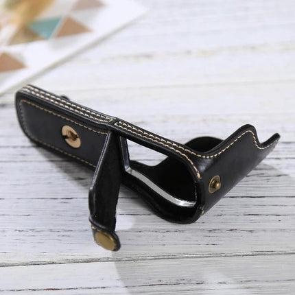 Protective PU Leather Half Case for Sony A5100 Camera in black with stitch detailing and brass snaps, open view showing interior access