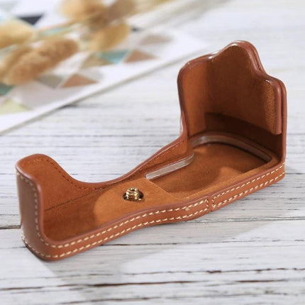PU Leather Half Case for Canon EOS M3 with 1/4 Inch Thread in brown PU leather showing stitched 1/4 inch tripod thread and interior protection