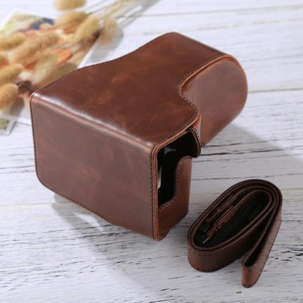 PU Leather Protective Case for Canon EOS M6 with 18-150mm Lens brown vintage camera bag on white wood surface