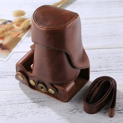 PU Leather Protective Case for Canon EOS M6 with 18-150mm Lens brown vintage-style protective camera case on wooden surface