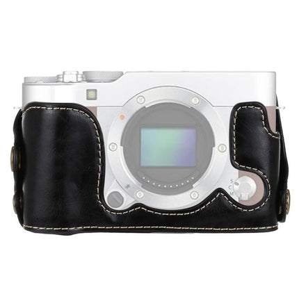 PU Leather Half Case with 1/4 Inch Thread for Fujifilm X-A3 and X-A10 black PU leather half camera case on Fujifilm X-A3 showing front sensor access