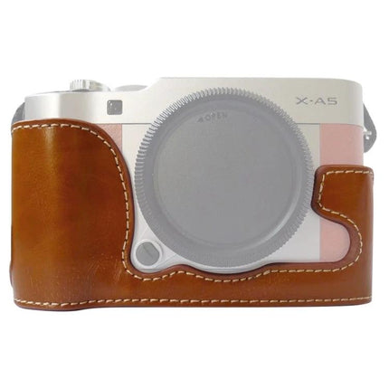 PU Leather Half Case Base for FUJIFILM X-A5 Camera shown in brown synthetic leather fitted on a silver X-A5 body