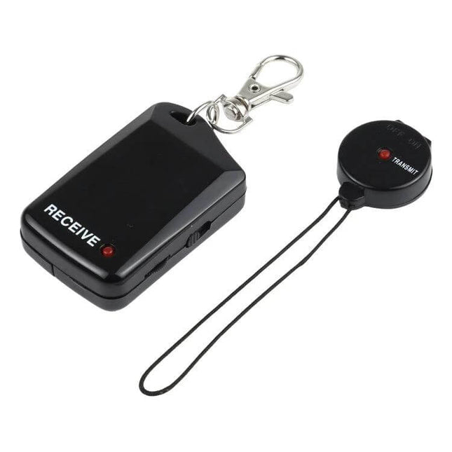 Wireless Anti-Lost Alarm for Tracking Everyday Items - compact black receiver and round transmitter keychain for keys wallets bags