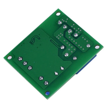 Automatic 5V Water Level Control Module for Tank Pumping green PCB back view with soldered contacts and mounting holes