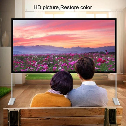 Folding 100-Inch Projector Screen with Bracket for Outdoor Use showing couple watching floral sunset on portable metal-frame screen