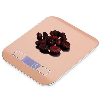 Digital Kitchen Scale For Measuring Ingredients, 10kg/1g Capacity - rose gold stainless steel surface with dried fruit on display and LCD readout