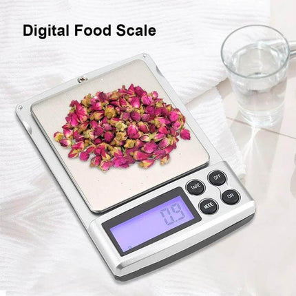Digital Pocket Scale 500g For Everyday Jewelry And Food Weighing - compact 500g pocket scale showing 0.9g with dried rosebuds on weighing pan