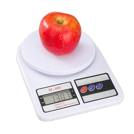 Digital Portable Kitchen Scale for Everyday Ingredient Measuring - compact white 1kg kitchen scale with apple on weighing platform and digital display