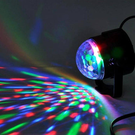 Disco Ball Party Light Sound Activated For Parties And Events compact rotating RGB disco light projecting red green blue patterns, sound-activated, plug-in or mountable