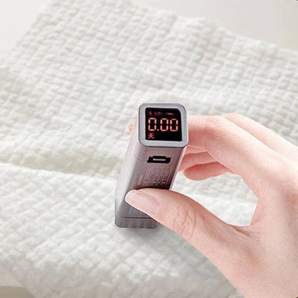 Disposable Compressed Towels 14 Pack For Travel And Daily Use - hand measuring towel texture on soft thick cotton sheet