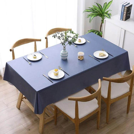 Disposable PVC Tablecloth 140x180 For Family Meals on wooden dining table with blue hemp-texture, non-slip surface set for casual meal