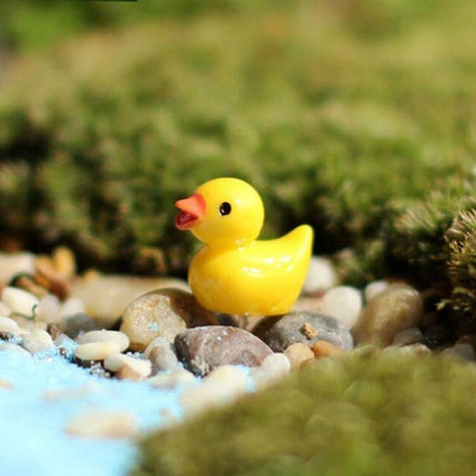 Dollhouse Yellow Duck Plant Decor Mini Five Pack For Dollhouses - single resin yellow duck among miniature pond pebbles and moss