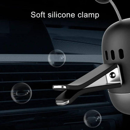 Cartoon Robot Car Air Outlet Aromatherapy Diffuser With Soft Clip showing soft silicone clamp attached to car vent