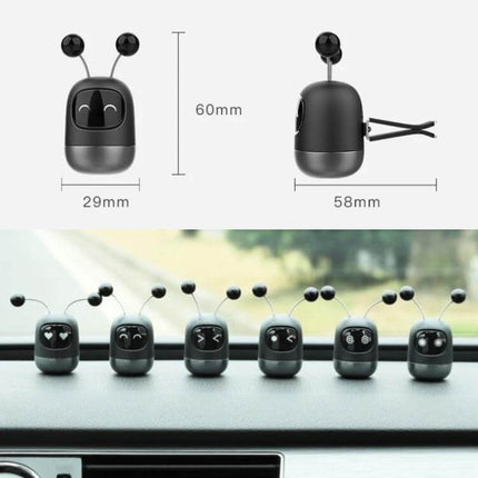 Cartoon Robot Car Air Outlet Aromatherapy Diffuser With Soft Clip compact cartoon design shown in black on car dashboard