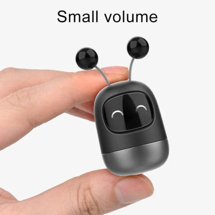 Cartoon Robot Car Aromatherapy Paste for Car Interiors shown as a small black robot-shaped compact deodorizer being held