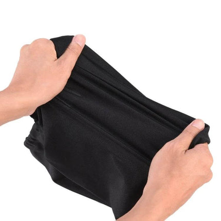 Computer Monitor Dust Cover Fits 19 To 31.5 Inch Monitors - black stretchable non-woven protective cover being pulled open by hands