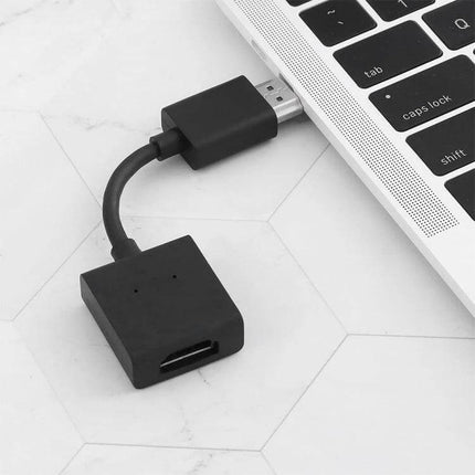 Rotatable Gold-Plated HDMI Extension Cable for 4K Connections showing a black rotatable adapter plugged into a laptop port