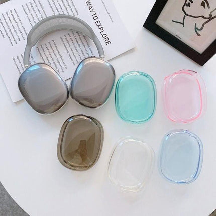 Protect Your AirPods Max with a Transparent Daily Case showing gray headphones and multiple clear colored protective covers on a table