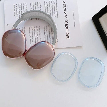 Protect Your AirPods Max with a Transparent Daily Case shown beside rose gold AirPods Max on a desk, clear protective earcup covers visible