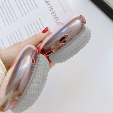 Protect Your AirPods Max with a Transparent Daily Case shown in rose-tinted clear cover on AirPods Max, guarding against sweat, dust, and minor drops