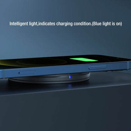Nillkin MC026 Portable Wireless Charger 10W Fast Charge With Smart Chip showing phone charging on anti-slip pad with blue indicator light and FOD safety