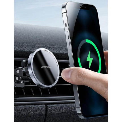 JOYROOM Magnetic Wireless Car Charger Holder for Smartphones attached to car vent charging a smartphone wirelessly