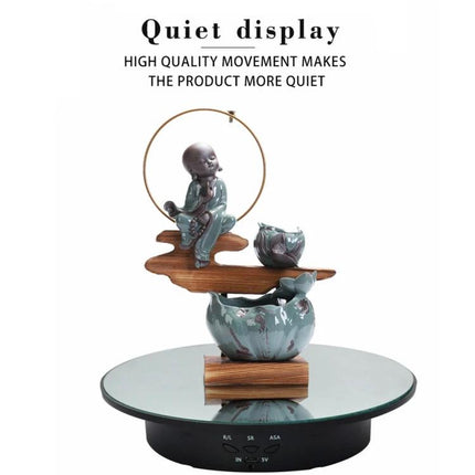 20cm USB Electric Rotating Turntable for Photography Displays showing jewelry and decorative figurine on glass platform, USB-powered 360° display
