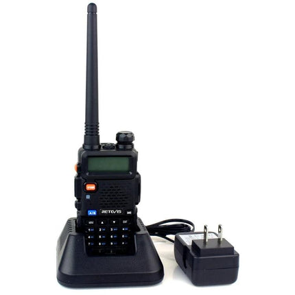 RETEVIS Handheld Walkie Talkie for Everyday Communication Use black dual-band handheld radio on charging dock with power adapter